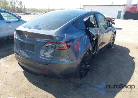 2022 Tesla Model Y Long Range Dual Motor All-Wheel Drive from USA, damaged, VIN 7SAYGAEE9NF574634